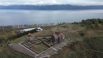 Sevanavank monastery in Armenia aerial top view in autumn video