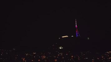 Tbilisi, Georgia - 28th october, 2024 - illuminated Tbilisi television tower at night. Georgia Tbilisi TV Broadcasting Tower. Free-standing tower structure used for communications. Mtatsminda Park video