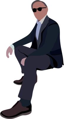 A man in a suit and sunglasses sitting on a chair