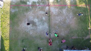 Aerial view of group of young men are playing takraw in the afternoon video