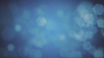 Abstract bokeh background animation with gently flickering defocused blue bokeh light hexagons. This elegant motion background is full HD and a seamless loop. video