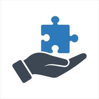 Puzzle icon. Puzzle piece in hand icon vector