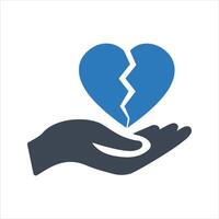 Broken heart icon. Heart in hand icon vector