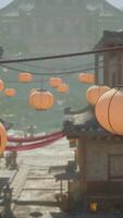 An oriental city with a red gate and mountains in the background video
