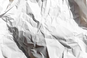 Crumpled white paper texture symbolizing creativity challenges and brainstorming, ideal for concepts related to problem solving and innovation photo