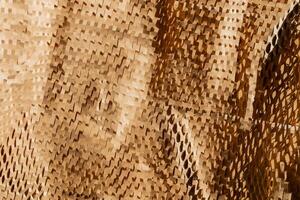 Close up texture of brown honeycomb cardboard represents eco friendly packaging solutions and sustainable practices in environmental conservation photo