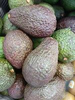 avocado is a fruit that contains a high amount of good fat, which is considered a superfood because it is very beneficial to the body. photo