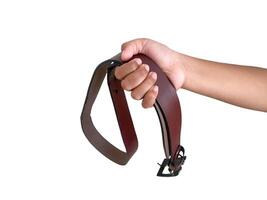 Man holding a leather belt photo