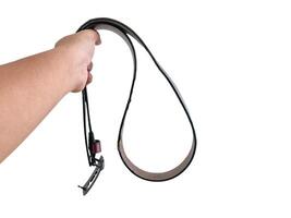 Man holding a leather belt photo