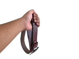 Man holding a leather belt photo