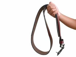 Man holding a leather belt photo