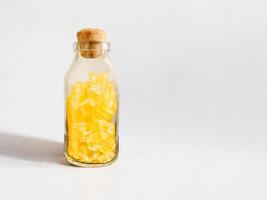 rock sugar on bottle isolate on white background. photo