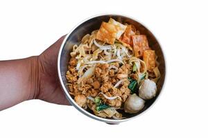 chicken noodle with meat balls and vegetables photo