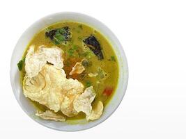 soto kuning is an authentic soto from bogor, indonesia. photo