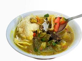 soto kuning is an authentic soto from bogor, indonesia. photo