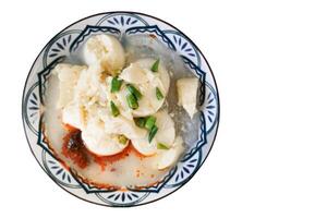 Spicy tofu soup isolated on white background. photo