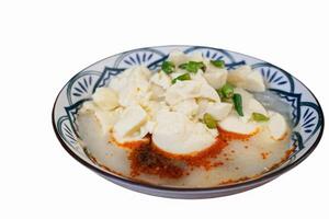 Spicy tofu soup isolated on white background. photo