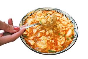 Spicy Kway Teow Soup with Tofu isolated on white background photo