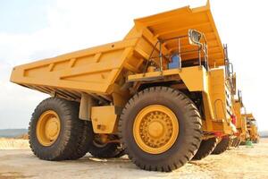 large yellow dump truck for mining industry photo