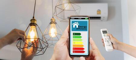 Man change a new electric bulb open air conditioning 25 degrees make a home more energy efficient photo