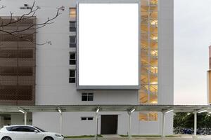 Mock up. A large blank billboard on a street wall signboard with room to add your own message. photo