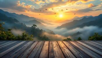 Wooden deck overlooking the mountains and fog photo