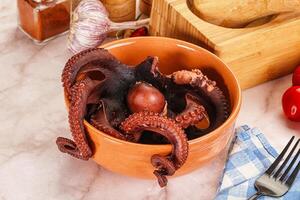 Boiled delicous Octopus in the bowl photo