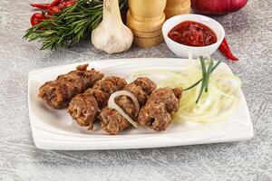 Beef kebab minced meat with onion photo