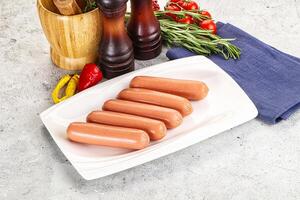 Boiled sausages for breakfast photo