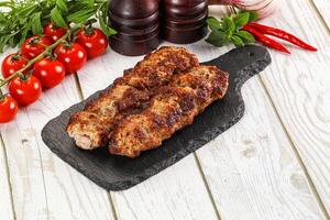 Chicken kebab minced meat and spices photo