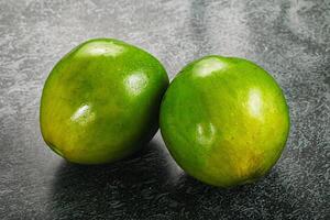 Two ripe green exotic avocado fruit photo
