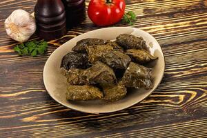 Stuffed dolma - meat in grape leaves photo