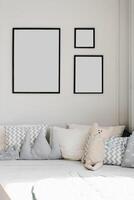 Creative pillows in the children's room on the catwalk and frames with empty space, mockups on the wall in the house photo