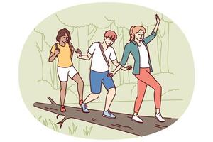 Group of friends participate in hike balancing on log thrown across river instead of bridge vector