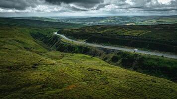 Aerial view of curvy windy roads on a moody summer day in Yorkshire, UK photo
