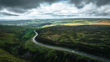 Aerial view of curvy windy roads on a moody summer day in Yorkshire, UK photo
