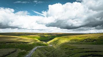 Aerial view of curvy windy roads on a moody summer day in Yorkshire, UK photo