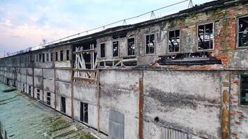 Aerial view from the air to an abandoned factory. Old industrial building for demolition. video