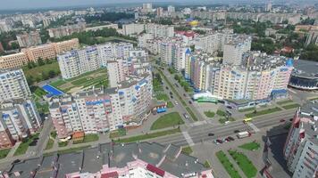 New built houses nicely planned in a new residential complex in a bright day. Flying over the modern district. Aerial view video