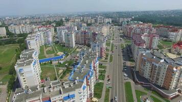 Panoramic view of modern residential complex with many high buildings nicely planned at day. New beautiful part of a city. Aerial view video