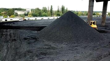 Aerial view of big pile of coal. Extractive industry, anthracite. Coal mining at an open pit video