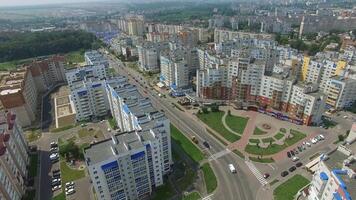 Beautiful view over modern part of the city with many high buildings in a sunny day. New built residential complex. Aerial view video