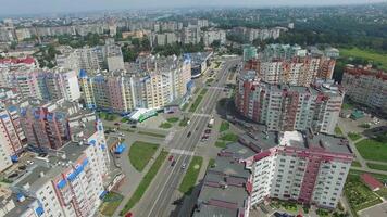 Landscape of a modern district with high-rise buildings for people in a summer day. Camera motion around. Aerial view video