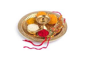 An image of a plate with various indian sweets photo