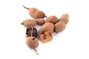 Tamarind isolated on white background. Sweet tamarind, Tamarind indica L. photo