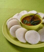 A plate with some indian food on it photo