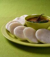 A plate with some indian food on it photo