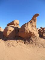 Sandstone Boulder that Looks Like a Dinosaur at Goblin Valley State Park, Utah photo