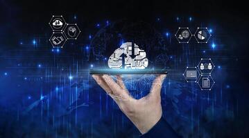 Cloud computing concept, a person's hand uses a smartphone connected to the cloud for data transfer. photo