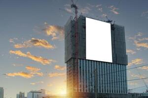 Large blank billboards on the street in the city. Mock up white background billboard on building, clipping path for Mockup. photo